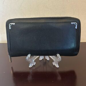 Cartier black leather wallet. GUC!!